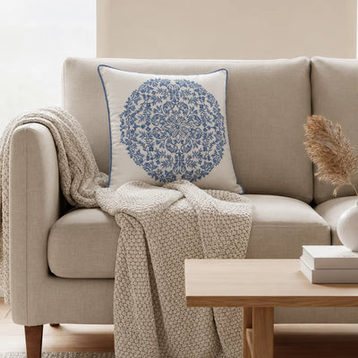 BLUE EMBROIDERED MEDALLION CUSHION
